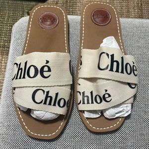 White and black sandals woody